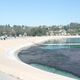 Illustration for article titled 400,000 Bouncy Black Balls Invade Reservoir to Save Los Angeles From Cancer Water